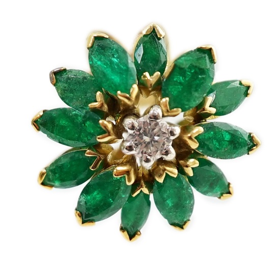 A modern pair of yellow metal, emerald and diamond set flowerhead stud earrings, 13mm, gross weight 6.4 grams. Condition - poor